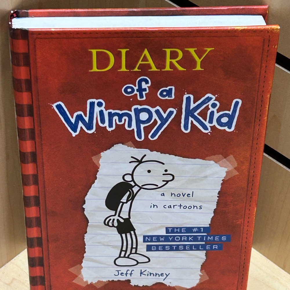Red Diary of a Wimpy Kid Book with Cartoon Cover